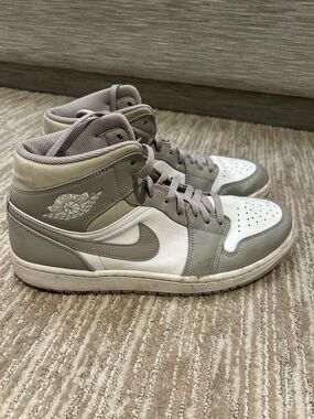 Jordan Mid-Top Sneakers in Gray and White.